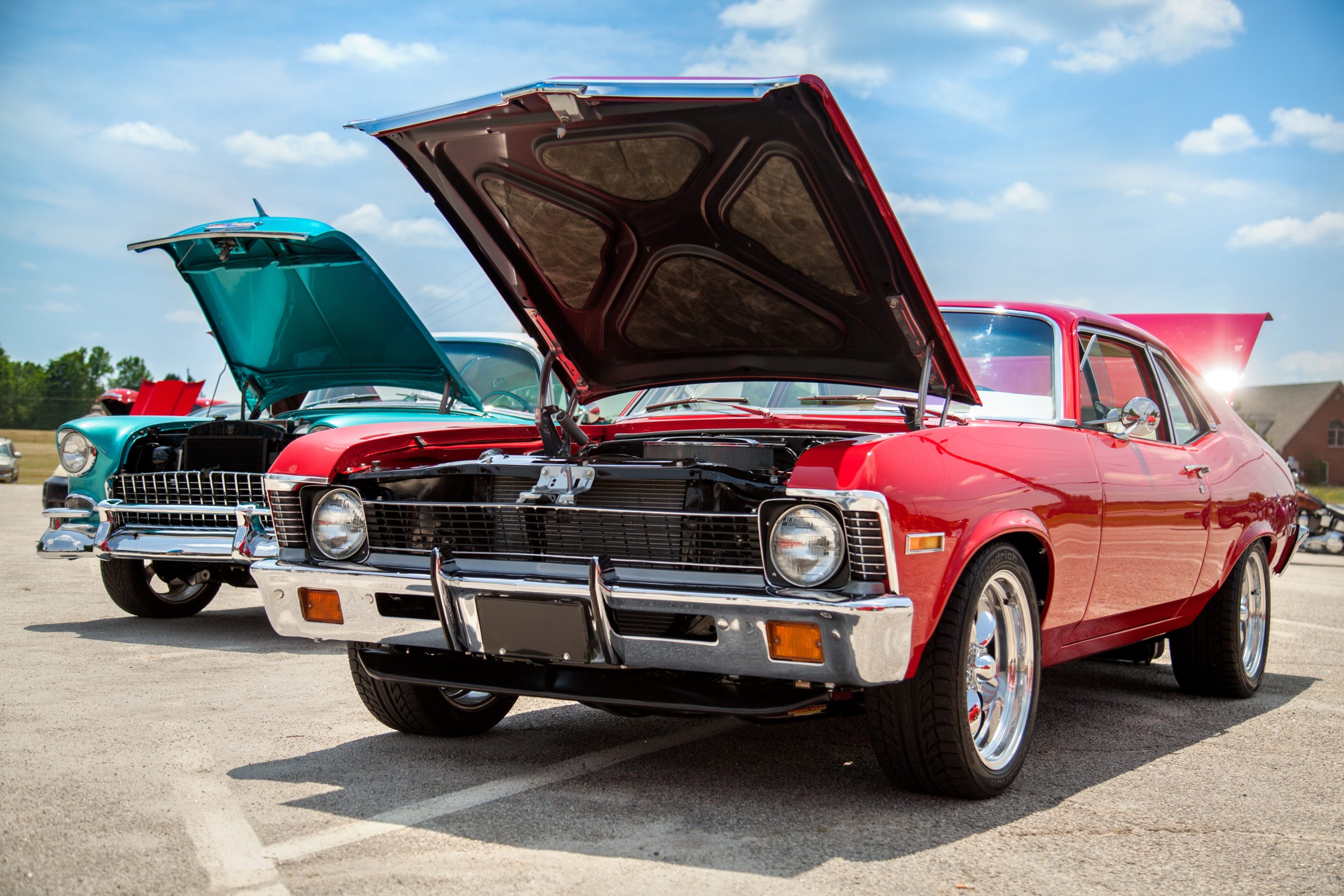 American muscle cars with the hoods open