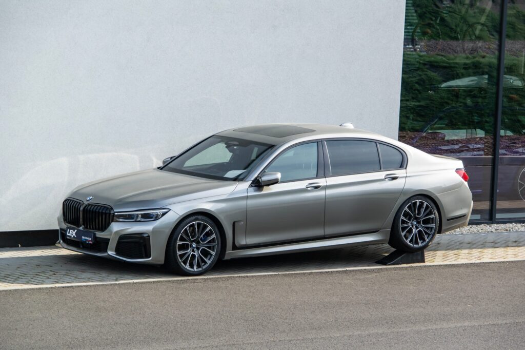 BMW 7-Series luxury saloon of G11 G12 generation in silver colour presented at dealership